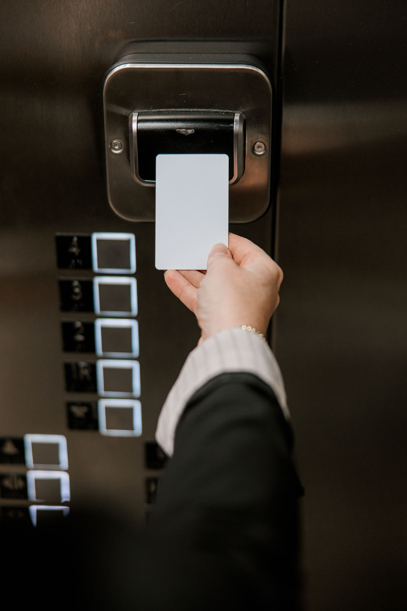 Modern hotel suite at YourSpace Hotels Chesapeake featuring keyless entry, smart thermostat, and advanced security technology.